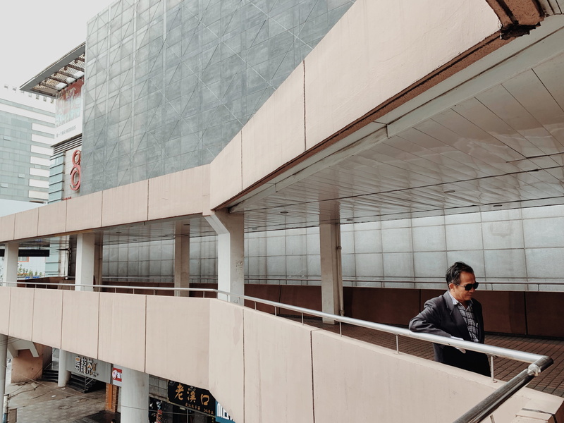 pedestrian, architecture, building exterior, accessory, glass - material, terminal, grey, handrail, su he 1 hao hua sen zuan shi shang wu guang chang, casual clothing