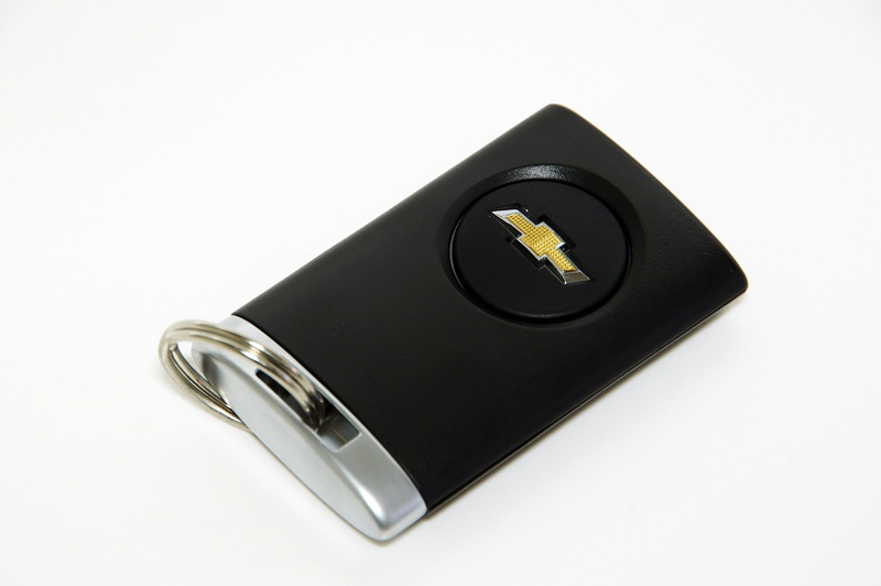 studio shot, no people, high angle view, grey, copy space, consumerism, black color, black, positive emotion, luxury, chevrolet, keypad, single object