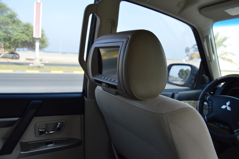 vehicle interior, mode of transportation, focus on foreground, glass - material, indoors, car, transportation, tv headrest, control panel, transparent