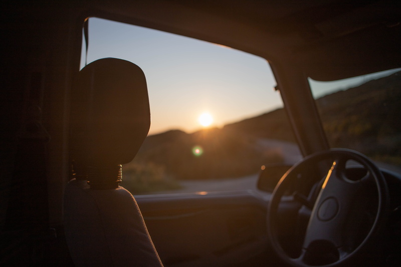glass - material, hand, car, steering wheel, window, lens flare, sunlight, nature, car mirror, transportation, close-up, red sky, 5K, machine, sky, outdoors