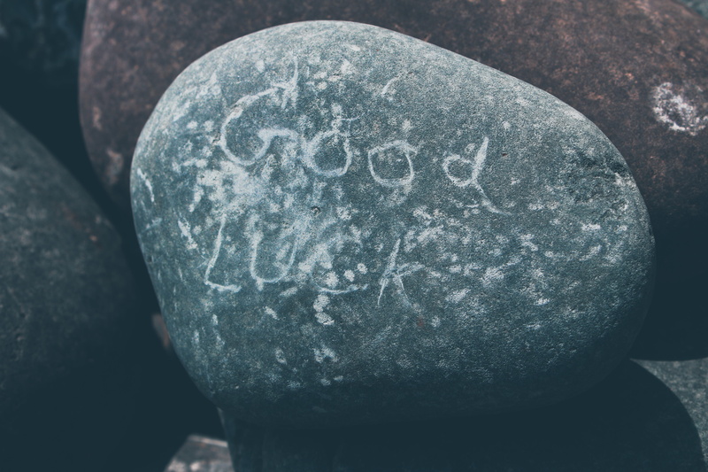 fossil, human representation, weathered, creativity, headrest, nature, craft, pebble, carving - craft product, no people, coal, rock, stone - object, tombstone