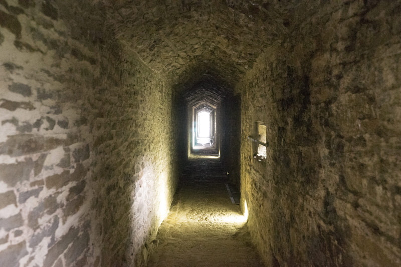 the past, tunnel, old, ceiling, caerphilly, caerphilly castle, passage, the way forward, no people, dungeon, punishment, prison, stone, wall, damp, light at the end of the tunnel