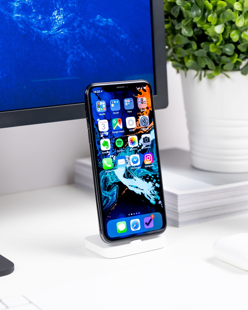 television set, nature, multi colored, vase, technology, portable information device, communication, screen, flowering plant, smartphone, device screen