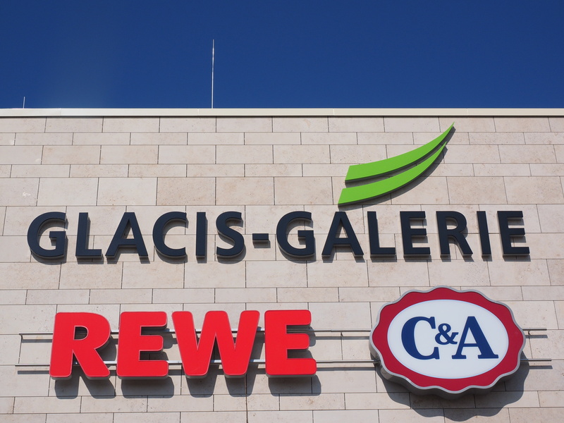 built structure, sky, media markt, information, text, c a, wall, rewe, capital letter, wall - building feature, advertisement, information sign, architecture
