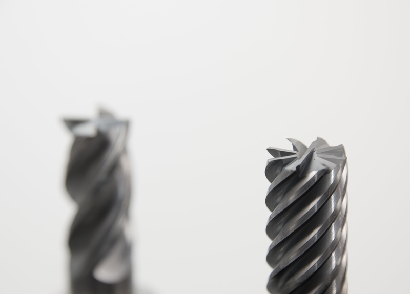 in a row, ingenieuerwesen, no people, cnc, rounding, drilling head, copy space, indoors, metalworking, technology, paper, mechanics, studio shot, 4K, focus on foreground