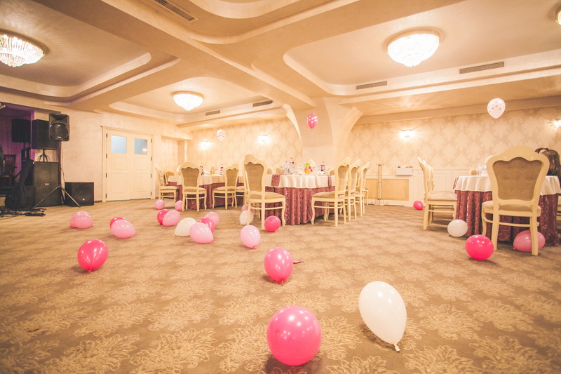 reflection, lighting equipment, party, celebration, flooring, table, no people, chair, architecture, decoration, pink color, illuminated, room, hall, arts culture and entertainment