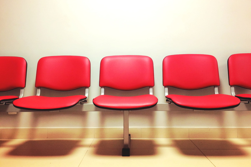 in a row, flooring, group of objects, order, seats, chair, arrangement, tiled floor, seat, empty, domestic room, relaxation, shadow, red, no People, waiting room