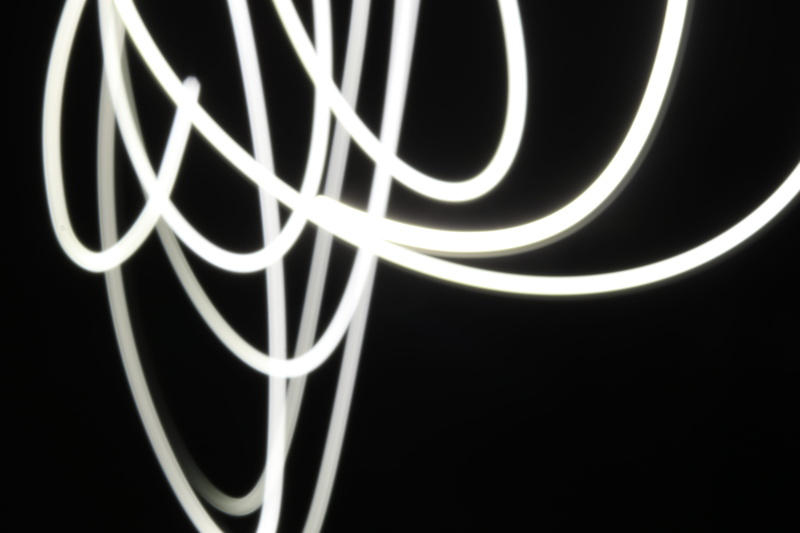 long exposure, handwriting, creativity, wire, light - natural phenomenon, technology, lighting, horn, studio shot, pattern, no people, alphabet, cable