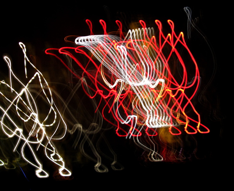 lighting, handwriting, ornament, no people, indoors, motion, technology, black background, multi colored, text, illuminated, 2K, long exposure, light trail