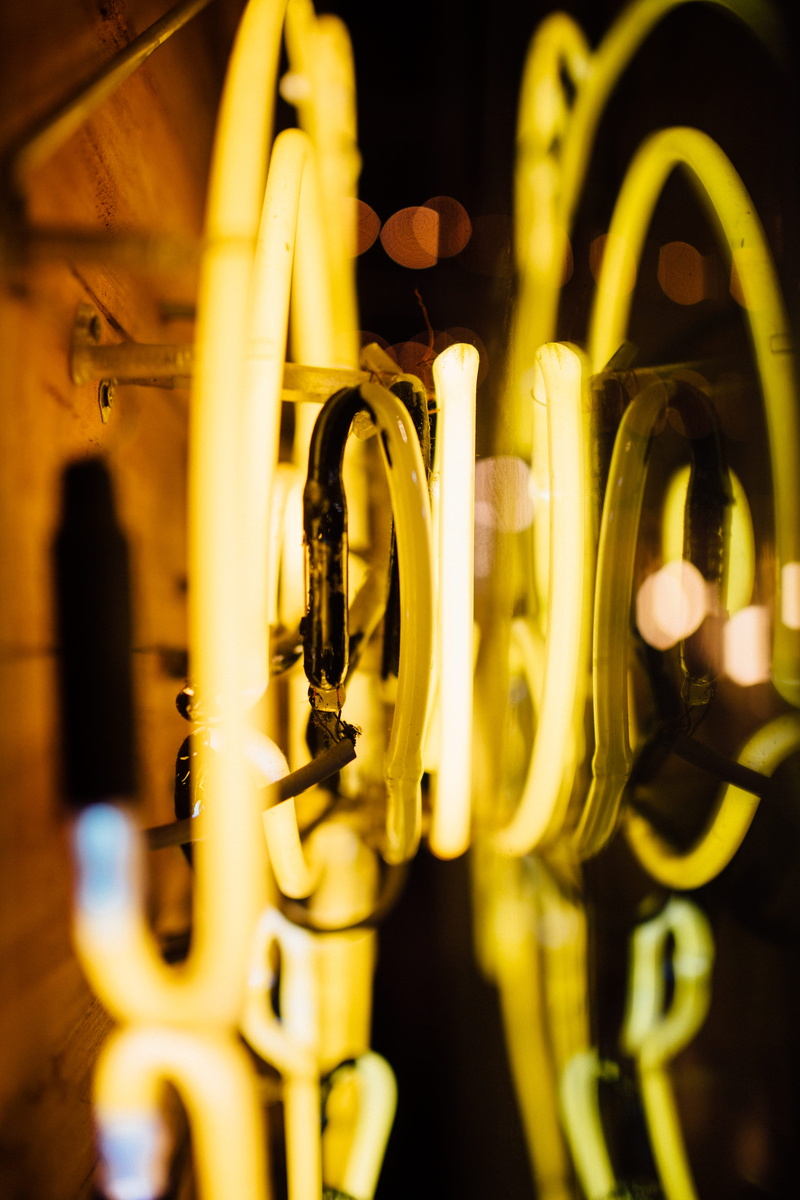 focus on foreground, spiral, lighting equipment, light - natural phenomenon, musical instrument, chain, 5K, amusement park ride, metal, focus, gong, night