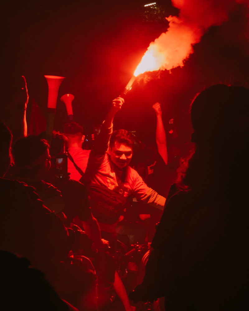 bonfire, event, black, nightlife, crowd, togetherness, young men, arts culture and entertainment, flame, leisure activities, night life, human arm, light