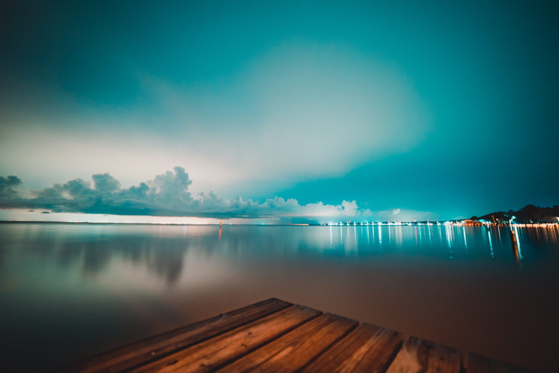 orange, lake, cloud - sky, outdoors, idyllic, beauty in nature, waterfront, teal, water, wood - material, blue, scenics - nature, dusk, no people, non-urban scene
