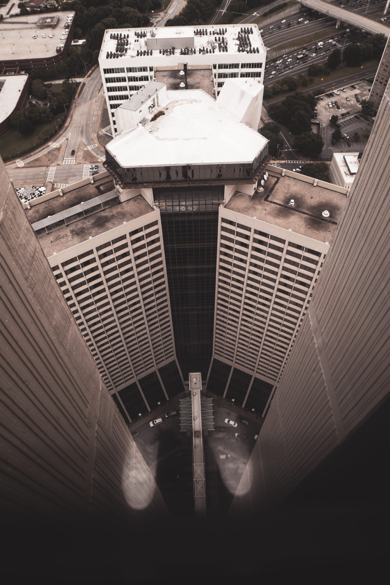 modern design, built Structure, photography, tower, urban, looking down, urban Skyline, aerial View, moody edit, modern, city Life, outdoors, no People