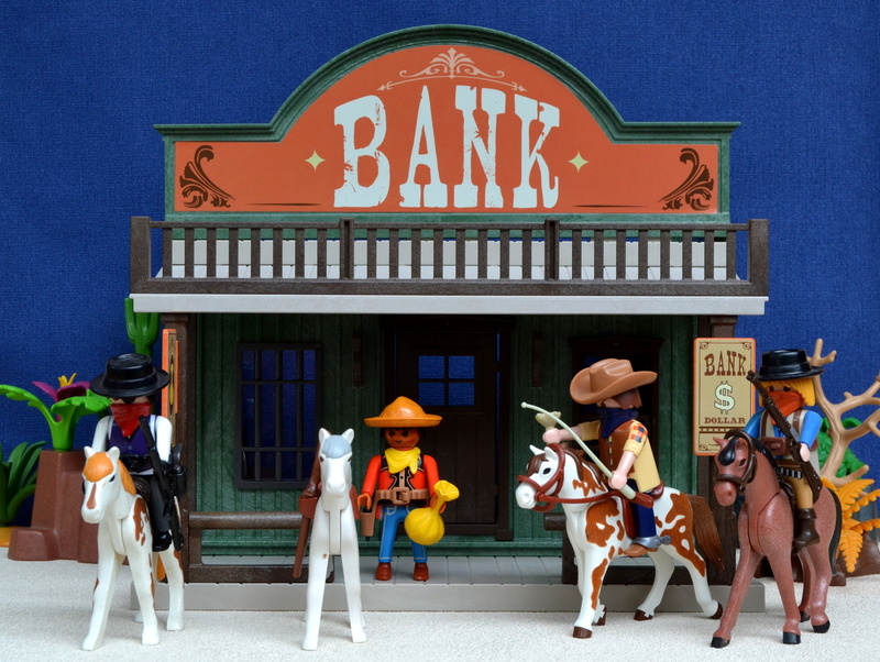 human representation, communication, robbery, women, outdoors, city, toys, architecture, representation, men, bank, real people, day, building exterior