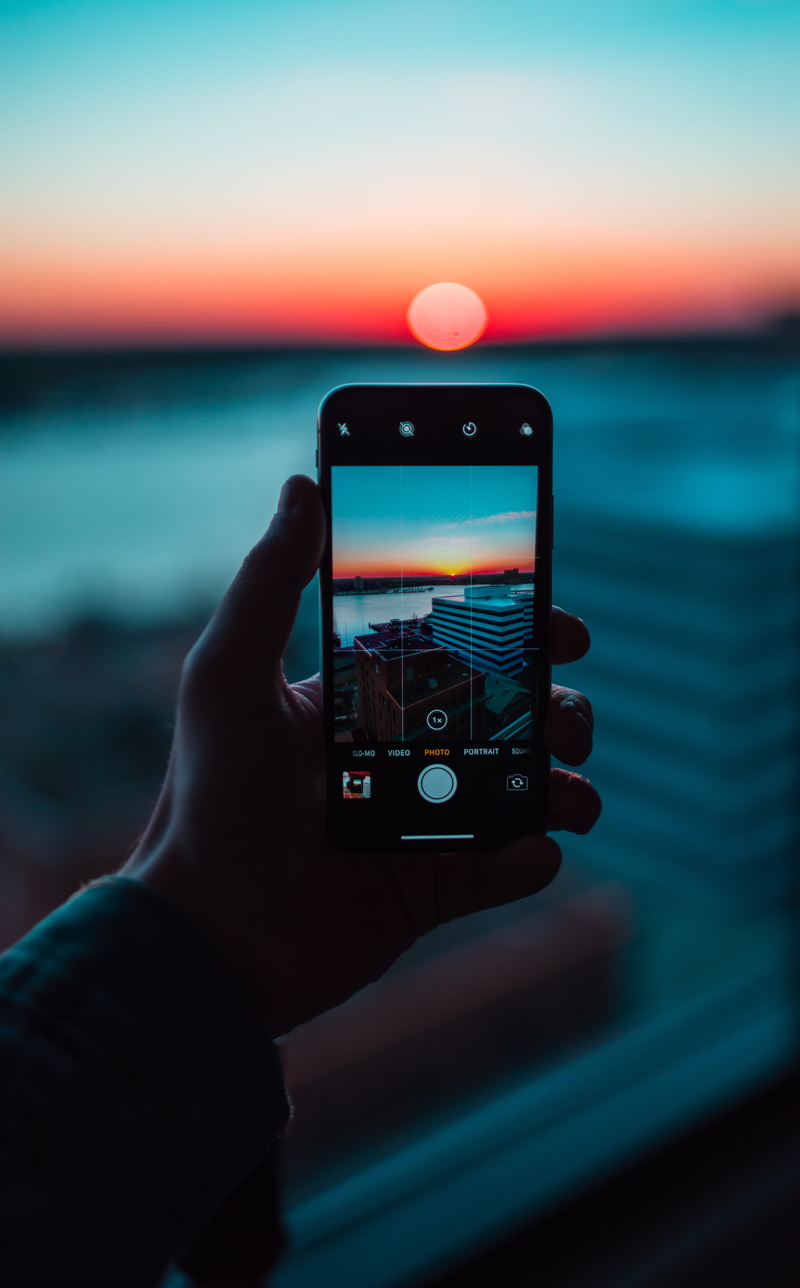 sony, smart phone, one person, iphonex, lifestyles, finger, sea, leisure activity, water, iphone, photographing, norfolk, real people, colors, mobile phone