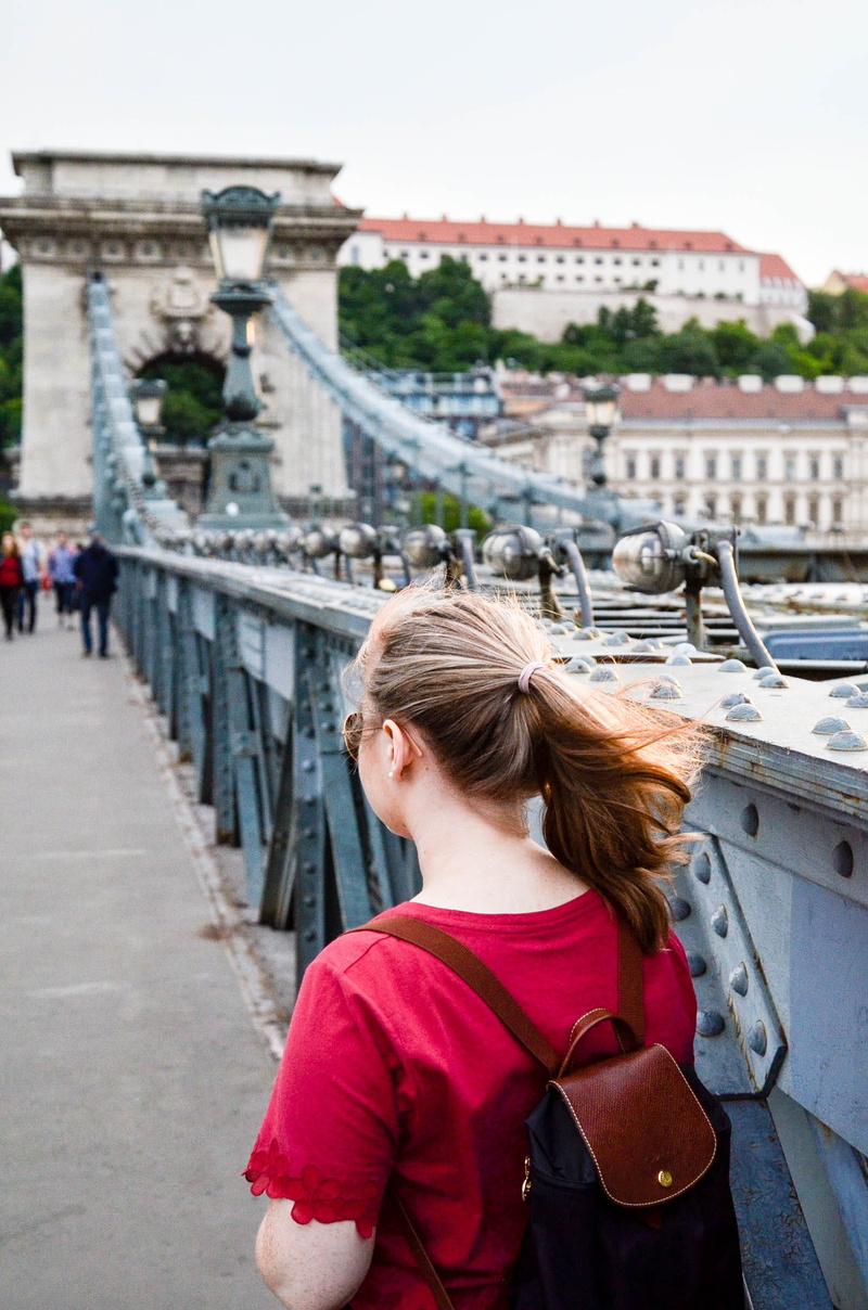 leather, girls, landscape, backpack, day, photo, brown, daylight, historic, wearing, lifestyles, street, vacation, real people, rear view, outdoors, built structure