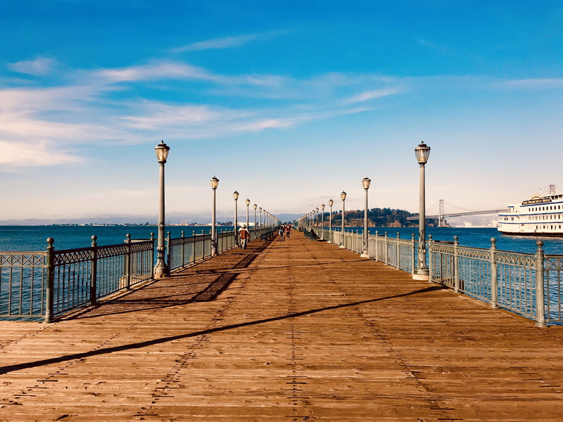 wood paneling, tranquil scene, tranquility, water, architecture, diminishing perspective, boardwalk, cloud - sky, the way forward, direction, sky, waterfront