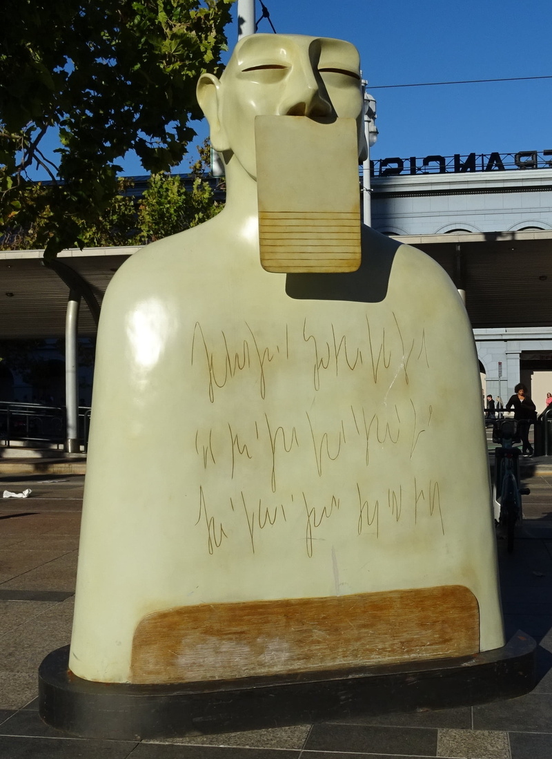 outdoors, one person, 1080P, dom, close-up, built structure, communication, text, tree, day, public art, america, cafe, real people, incidental people