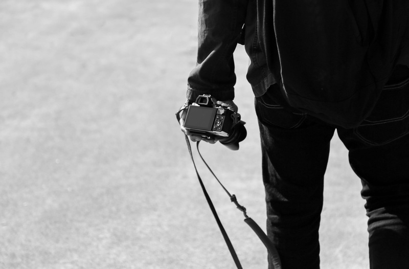day, focus on foreground, real people, nature, human body part, minimalism, 2K, san francisco, ferry building marketplace, camera, photographer, body part