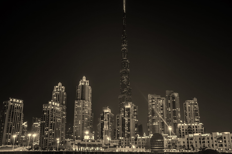 monochrome, skyscraper, travel destinations, outdoors, modern, architecture, city, tall - high, tower, spire, city lights, buildings, no people, illuminated