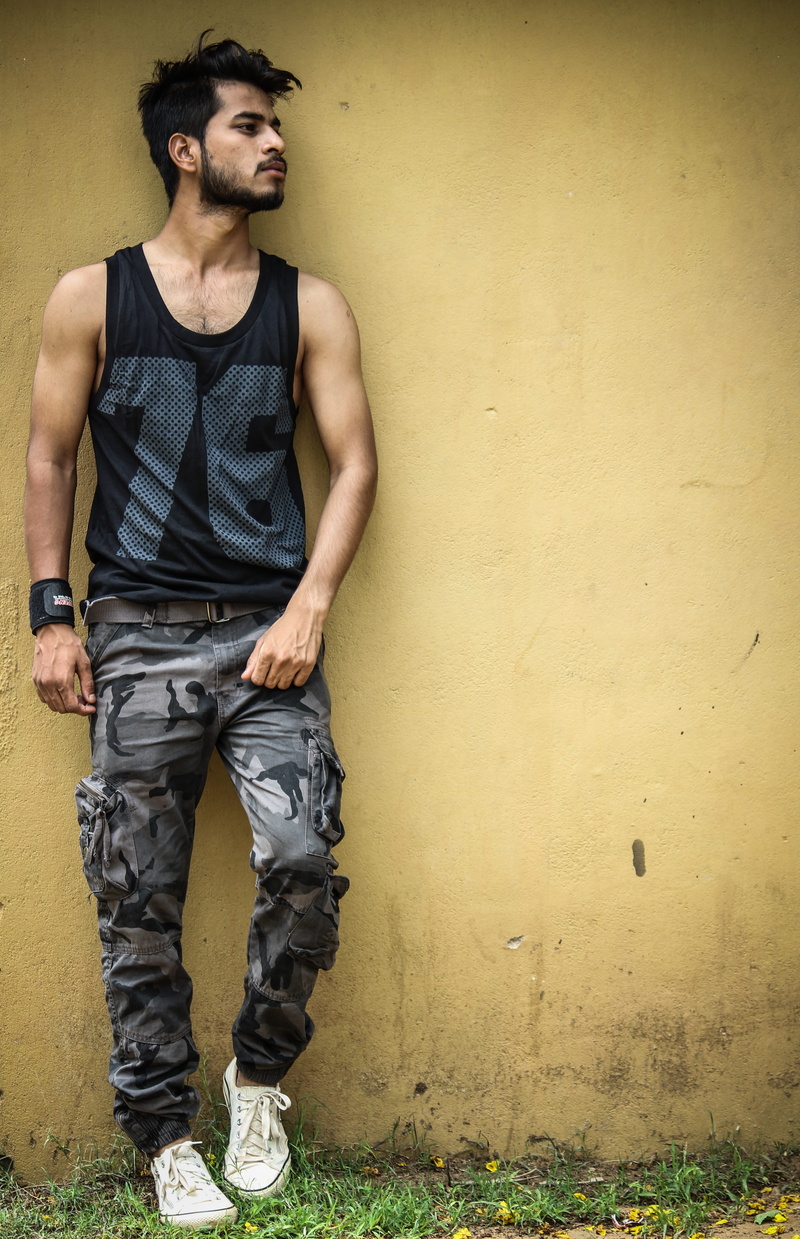 one person, young men, real people, 5K, young adult, wall - building feature, jeans, architecture, beautiful people, day, photography, front view, full length