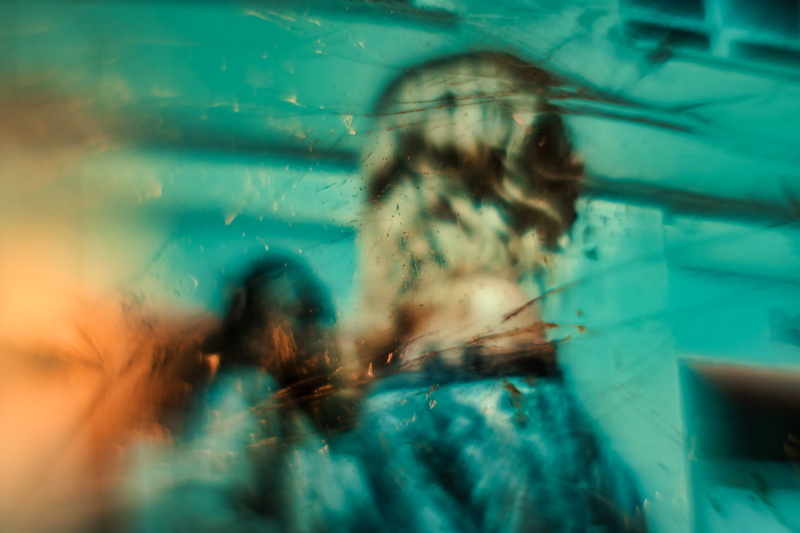 fantasy, transparent, cover, paint, nature, selective focus, epic, mindfulness, surreal, outdoors, clothing, one animal, expressionism, swimming pool, close-up