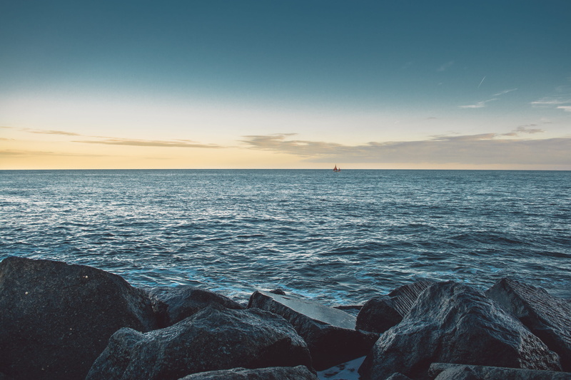sea, solid, idyllic, rock, sky, outdoors, body, beauty In Nature, sunset, cloud - Sky, tranquility, landscape, Shore, scenics, 4K, nature, no People, boat