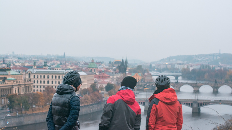 5K, oldtown, people, looking at view, standing, building exterior, prague, brigde, built structure, cityscape, adventure, hood - clothing, leisure activity