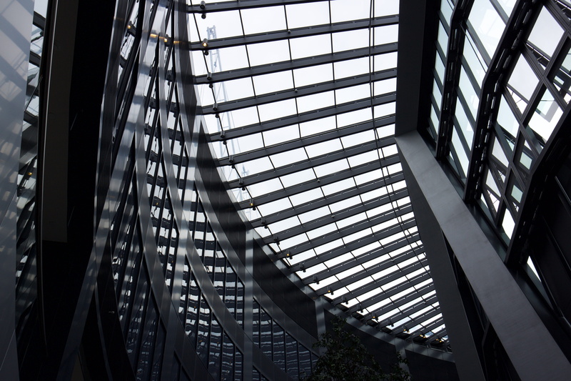 transportation, car, urban, building exterior, travel destinations, skyscraper, modern, housing, condo, skylight, sky, directly below, outdoors, transparent