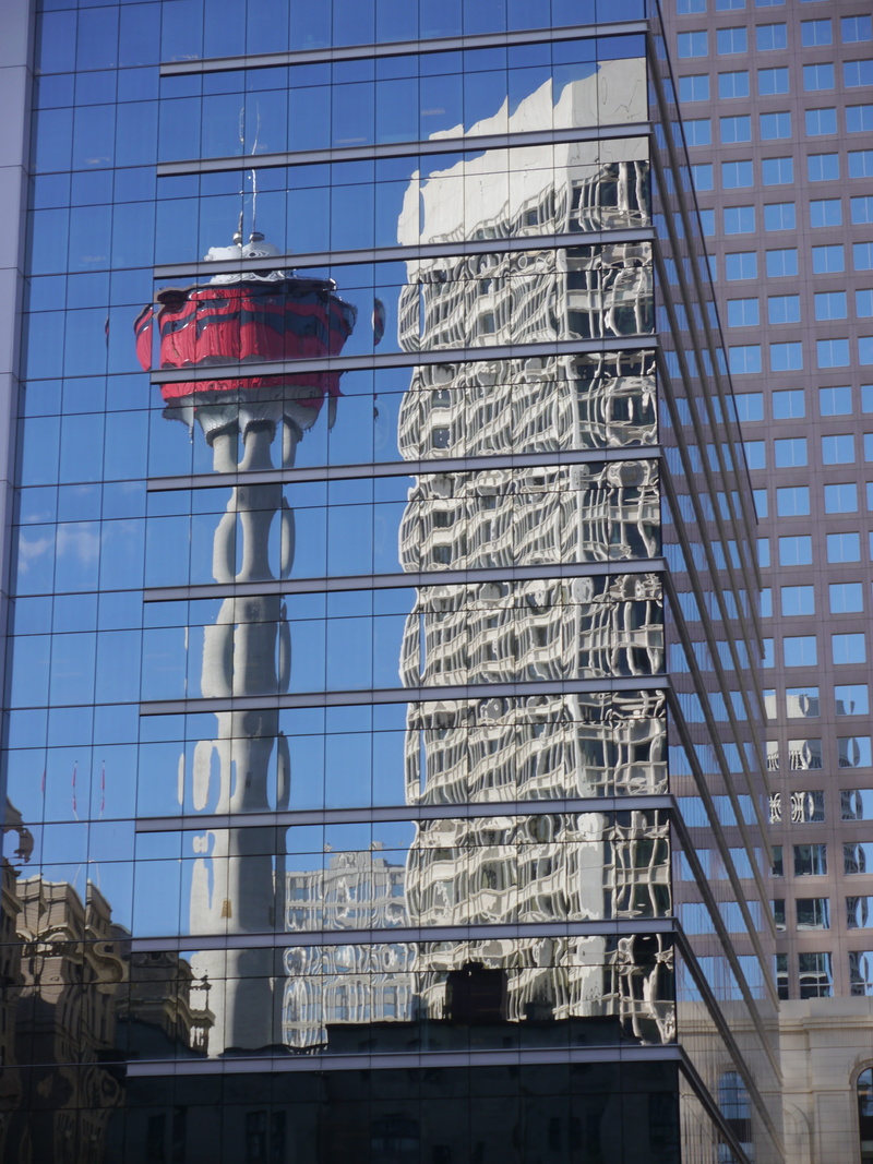 building, tower, glass - material, calgary, office building exterior, built structure, sky, tall - high, city, building exterior, travel destinations, communication