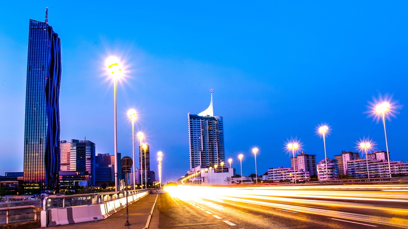 auto, lens flare, reflection, building, transportation, motion, skyscraper, built structure, car, city, multiple lane highway, modern, building exterior