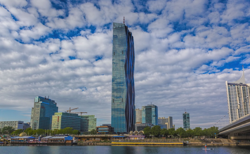 financial district, office building exterior, no people, travel destinations, center, modern, dc, cloud - sky, outdoors, tourism, tower, waterfront, sky
