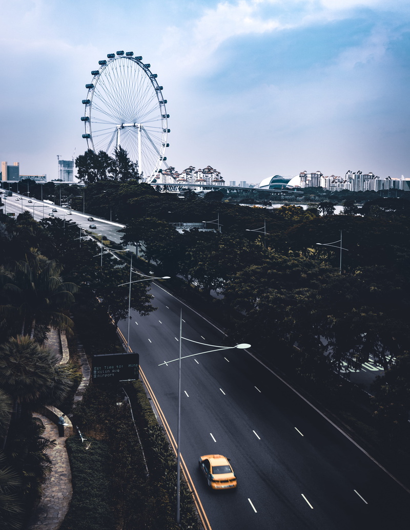 ferris wheel, outdoors, cityscape, high angle view, amusement park ride, 4K, building exterior, nature, motor vehicle, roads, architecture, highway, cloud - sky