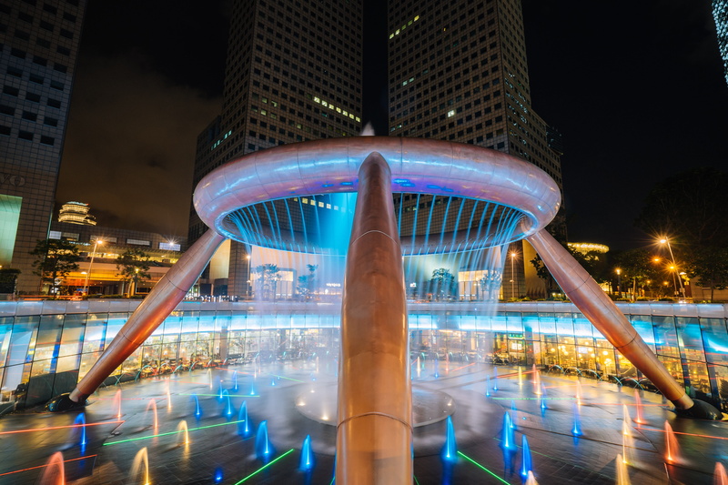 cityscape, building, built structure, 5K, no people, night, fountain, office building exterior, motion, city life, skyscraper, singapore, modern, travel destinations