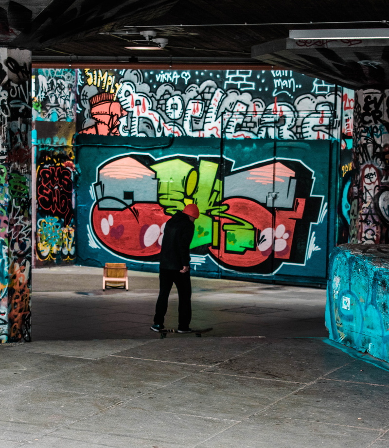 skate, street photography, real people, skateboard, graffiti wall, leisure activity, rear view, one person, skaters, uk, full length, candid, england, art
