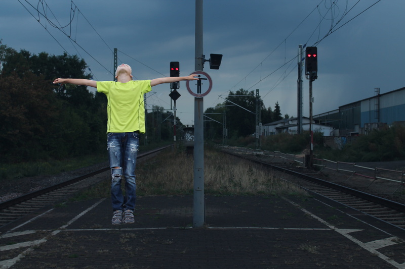 criminal, authority, day, rebel, open, real people, broken, trespassing, arms raised, transportation, one person, nature, closed, leisure activity, electricity