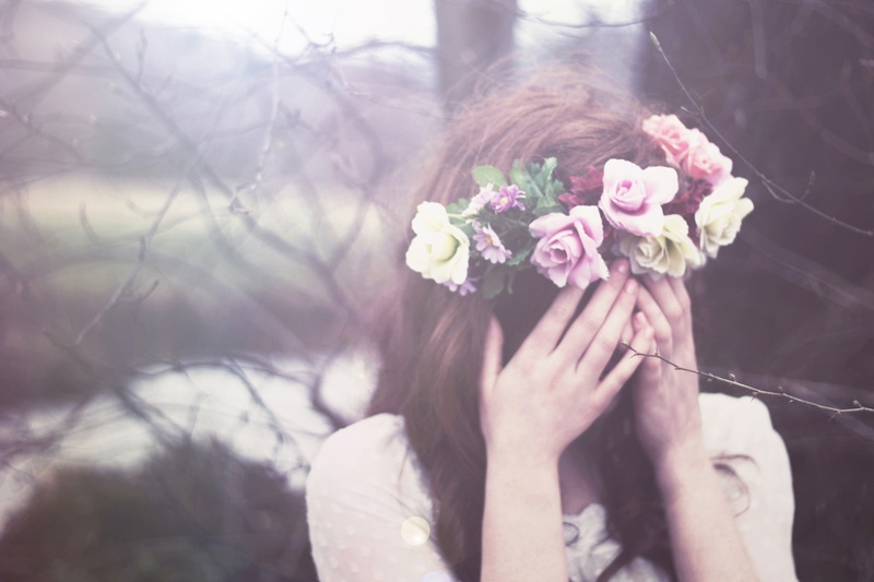 covering face, hairstyle, beauty in nature, plant, one person, flower, obscured face, close-up, portrait, headshot, tree, real people, focus on foreground