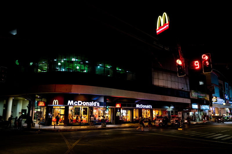 bohol, car, text, road, life, built structure, light, transportation, incidental people, city life, sign, 2K, architecture, night, outdoors, philippines