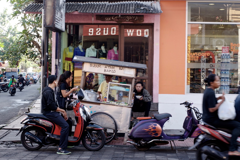 city, ubud, architecture, indonesia, roadside, men, buying, land vehicle, real people, store, ayam, road, streetphotography, built structure, vespa, bicycle
