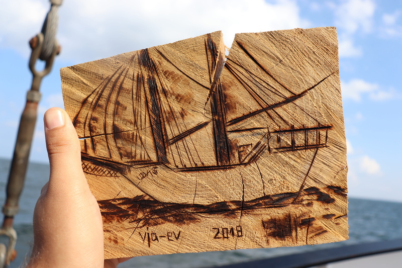 5K, nature, sail, lifestyles, wood, sea, hand, one person, day, carve, outdoors, leisure activity, human body part, water, sky, ship, personal perspective