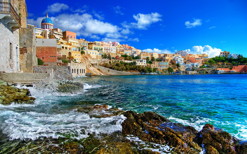 greece, syros, houses, buildings, sea, islands, clouds, sky, rocks, greek, town, trees, ocean, shore, architecture, cliff, 1080P, waves, cities, resort