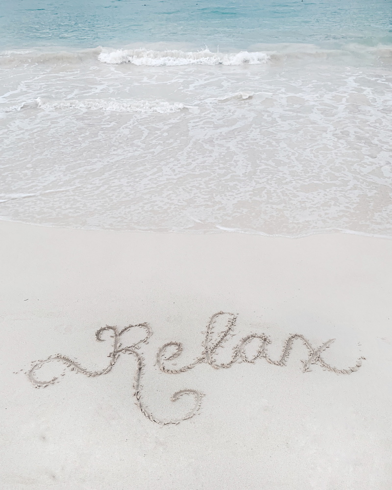 no people, pavement, text, land, outdoors, sand, handwriting, western script, ocean, animal, sea, celebration, day, punta cana, dominican republic, communication