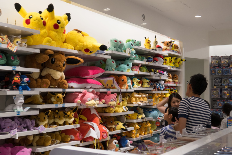 toy, arrangement, 4K, men, shop, person, pokémon, for sale, large group of objects, sale, group of people, plush, pikachu, real people, shoe, teddy bear