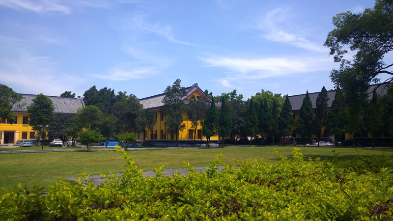 day, grassland, built structure, building exterior, green color, china, building, cloud - sky, guangxi normal university, travel destinations, blue sky