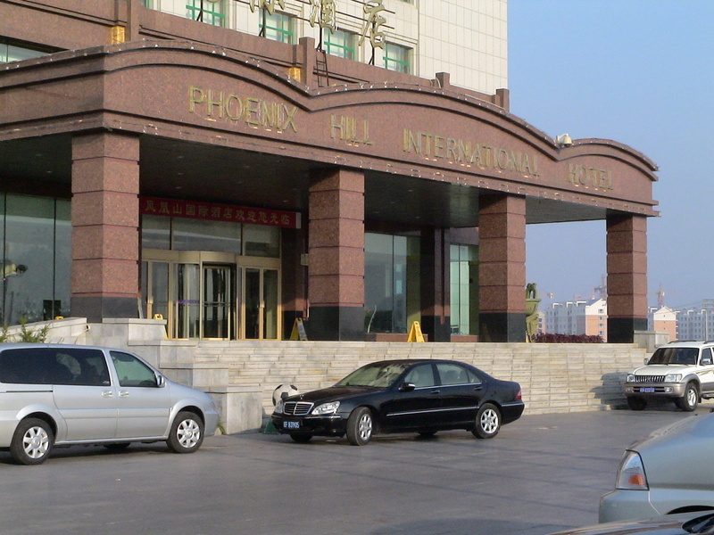 no people, sunlight, phoenix hill, outdoors, building exterior, hotel, international, entrance portal, travel, city, motor vehicle, mode of transportation