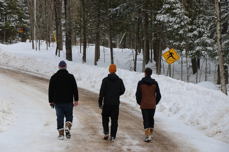 real people, stride, snow, lifestyles, warm clothing, street, 2K, walk, men, big cedar lake, friends, full length, group of people, winter, cold temperature