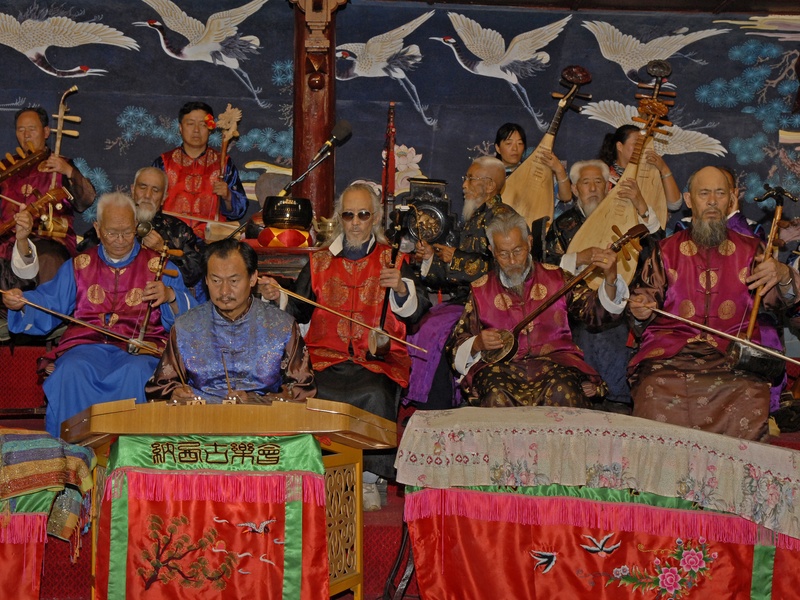 china, crowd, female likeness, day, group of people, real people, poster, architecture, men, creativity, naxi orchestra, large group of people, arts culture and entertainment