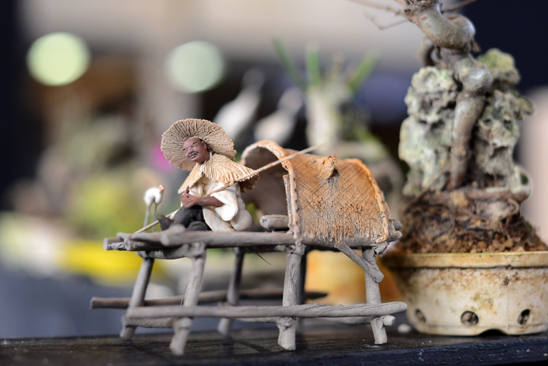 japanese, metal, flower, statue, day, fernöstlich, figurine, outdoors, 5K, sculpture, focus on foreground, wood - material, one animal, representation