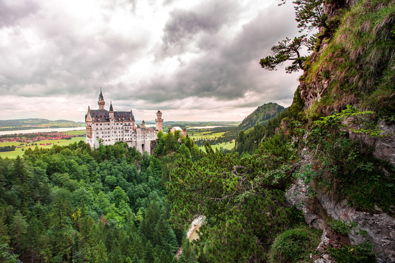 land, landmark, towers, daylight, travel, water, cloud - sky, trees, outdoors, bran, nature, beauty in nature, green color, mountains, scenics - nature
