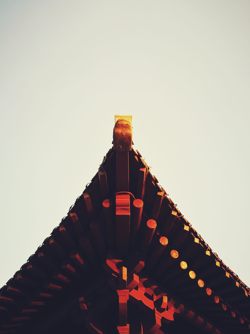low angle view, roof, travel, architecture, pavilion, day, copy space, place of worship, no people, dusk, china, building exterior, clear sky, sky, travel destinations